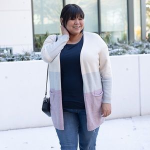 Size medium soft and cozy cardigan! Excellent used condition.